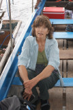 Judy on a shallow-bottom boat to visit Prek Toal, a bird sanctuary - Tonle Sap Lake, Siem Reap Province, Cambodia