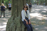 Judy on the gravel road to the Meiji Shrine complex surrounded by cedars.