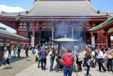 Judy next to the incense burner in front of the Main Hall of the Senso-ji Temple - Tokyo