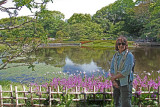 Judy in front of irises in the East Garden of the Imperial Palace - Tokyo