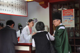 Preist (green robe) who presided over an Omiyamairi (newborn celebration) which we witnessed but were not allowed to photograph