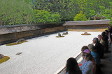 Judy after meditating (yoga?) at the Kare-sansui (Dry Landscape) Rock Garden or Zen Garden at the Ryoanji Temple