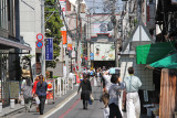 Nishiki-dori (street) - a white awning is at the entrance of the covered Nishiki Market at Takakura-dori in Kyoto