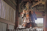 Statue of Komokuten (at least 30 feet tall) in the Main Hall of Todai-ji Temple in Nara Park in Nara