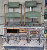 Old shoe shine stand in front of an antique store at the main interesction in downtown Breaux Bridge in southwestern Louisiana