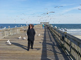 Judy and seagulls on the fishing pier - East Coast of Tybee Island