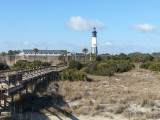 The Tybee Lighthouse and a walkway to the beach on the North Coast of Tybee Island