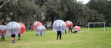 Bubble Soccer with players wearing Battle Balls  in Forsyth Park - Savannah