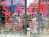 Independence Day Sale Window with Reflections