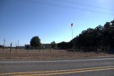 Confederate flag near Utopia, TX.  Check the trailer. Redneck living big.