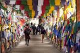 Footbridge covered in prayer flags