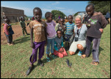 Madelene with children at the local cattle market