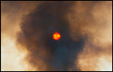 Heavy smoke against the sun - Grönhögen