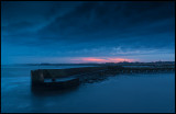 Gräsgårds harbor and church at dusk