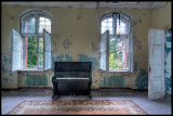 Old piano left in one of the men`s buildings