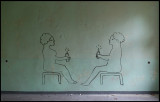 Artistic graffiti in the men`s house