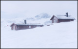 Small norwegian hytter in storm