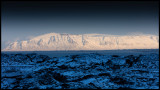 Sun on the mountains near Reykjavik