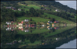 Small village Olden mirroring in the ocean