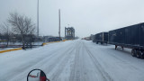 Snow Has Tapered Off Just As Im Leaving....Note The Crane That Lifts From Trucks Directly Onto Rail Cars