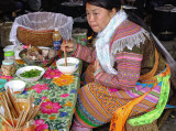 Hmong lady is having her  breakfast
