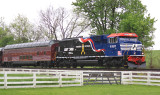 Veterans unit 6920 leads Eastbound 975 by the Aggee farm at Vanarsdale