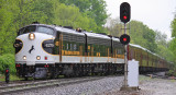The outbound Derby train takes the siding at West Waddy as the rain continues to fall