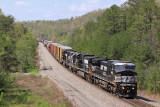 A old CR GE in new paint brings 142 down the hill at Parkers Lake