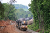 Piles of rock from recent blasting can be seen in the background as 170 comes North near MP 164.5 