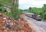 Debris from a house that was removed litters the side of the new cut at MP 164.1 Several more will have to be taken down soon 