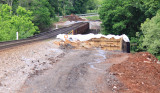 A new abutment and wing wall has been poured on the North side of the Pittman Creek bridge 