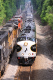 A Northbound with at ATSF warbonnet leading meets OCS 955 at Whitley City