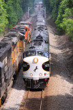 A Northbound with at ATSF warbonnet leading meets OCS 955 at Whitley City 