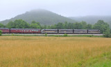 The morning fog clings to the knobs as NS 955 eases through the Green River Dip near Southfork