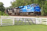 Conrail 8098 leads Eastbound coal loads through downtown Vanarsdale 