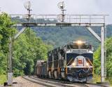 Wabash 1070 glistens in the sun as it leads 142 under the signals at Palm
