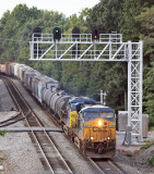 NS 143 at Southern States near Somerset...Ugly CSX power and ugly new signals