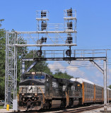 The new signals are up (but not yet in service) as train 275 comes South on a hot afternoon