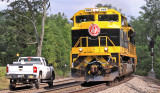 Virginian 1069 passes a track inspector at the East end of Tucker