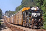 A former N&W SD40-2 has Southbound 275 rolling at track speed (60mph) through Gradison