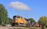 A UP SD70m leads train 167 through downtown Moreland KY on a cool September morning