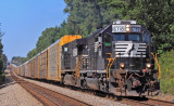 NS 275 flies down the tangent at Gradison with a EMD on the point and over a mile of racks stretched through the dips 