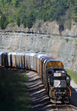 The cut is filled with the sweet music of a hard working EMD as train 275 climbs Kings Mountain