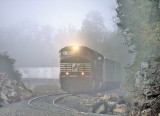 10/12/13 The blasting crew has halted work as 264 rolls through the fog at the cut just South of Pittman Creek