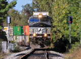 23G passes the signal at West Harrodsburg with the dynamics on hard, slowing for the street running just ahead
