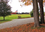 Old Glory snaps in the wind as the train rolls through the farmland at Rich Valley on a cold Saturday morning