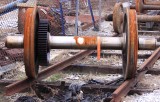 A well used EMD locomotive axle 