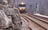 11/15/13 Northbound 124 passes a signal gang near CP Grove. New rail and ties have been placed for the new track on the right 