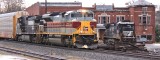 Lackawanna 1074 leads NS 289 through downtown Lawrenceburg, Kentucky