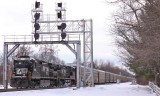 Northbound 29W comes under the old GRS model SC signals at Junction City as the train rattles across the ghost of the L&N
